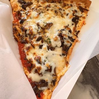 Spices & Slices - OXTAIL SLICE - Succulent Brown Stew Oxtail - Pizza Near Me - Brooklyn, New York