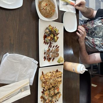 Oec Japanese Express - Fried rice, dragon roll, crunch Kani cheese roll, fire bomb roll, samurai roll (left to right ) - Japanese Near Me - Bartlett, Tennessee