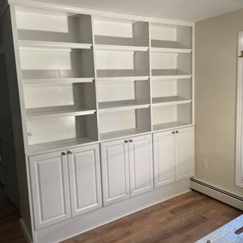 5-Mile Creek Construction - Homeowner had a great idea to combine cabinet uppers with custom shelving for this unique built-in bookcase. - General Contractors Near Me - Harbor Springs, Michigan 5-Mile Creek Construction - Homeowner had a great idea to combine cabinet uppers with custom shelving for this unique built-in bookcase. - General Contractors Near Me - Harbor Springs, Michigan