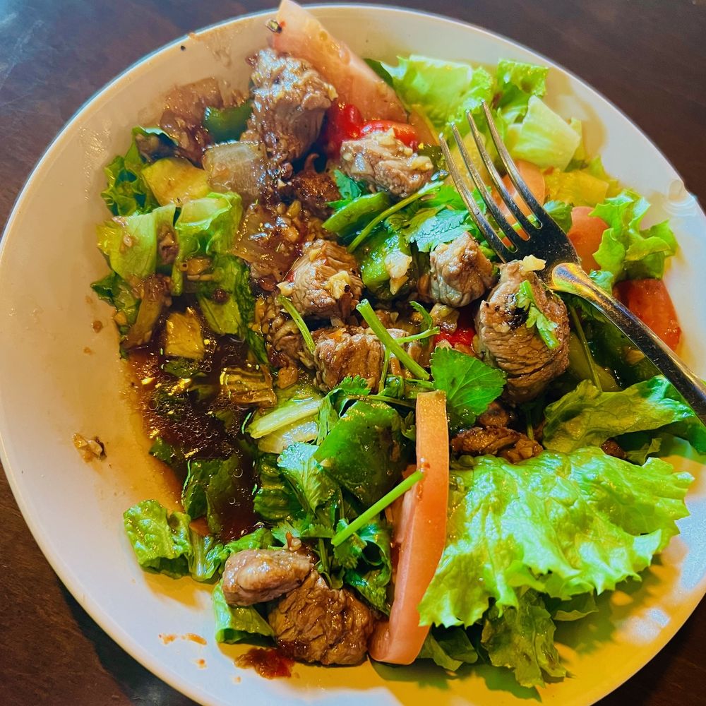 District One Kitchen and Bar - shaking beef salad is full of liquid and greens are melting - Asian Fusion Near Me - Las Vegas, Nevada District One Kitchen and Bar - shaking beef salad is full of liquid and greens are melting - Asian Fusion Near Me - Las Vegas, Nevada