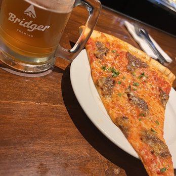 Bridger Brewing - Slice of Bison Pepperoni Pizza - Breweries Near Me - Bozeman, Montana Bridger Brewing - Slice of Bison Pepperoni Pizza - Breweries Near Me - Bozeman, Montana