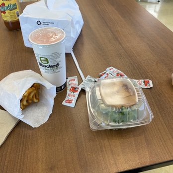 Stacked Bar and Grill - a sandwich and drink on a table - Bars Near Me - Kingsburg, California Stacked Bar and Grill - a sandwich and drink on a table - Bars Near Me - Kingsburg, California