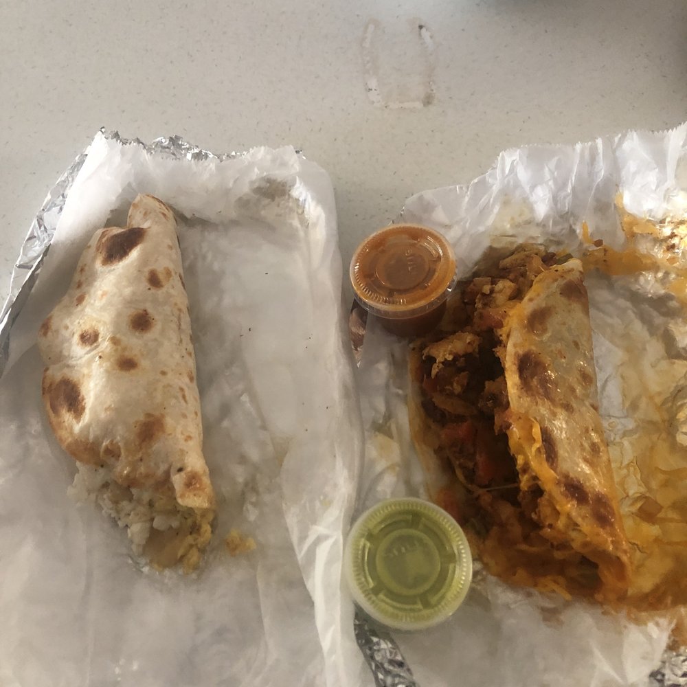 Breakfast Taco on left. Breakfast Burrito on right. Sad face on me. Breakfast Taco on left. Breakfast Burrito on right. Sad face on me.