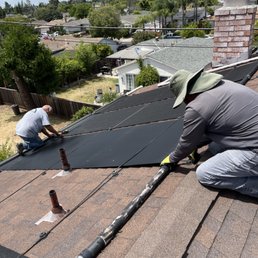 Balvino and Robert working on the roof!
