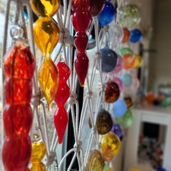 AD Glass & Design - Ornaments hanging out catching some sun - Art Galleries Near Me - Bend, Oregon