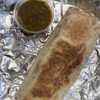 Huckleberry Roasters - Bacon breakfast burrito with verde salsa - Coffee Roasteries Near Me - Denver, Colorado