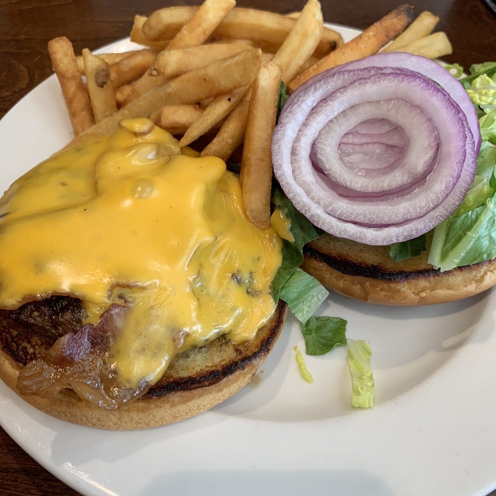 Bacon cheeseburger with fries. Bacon cheeseburger with fries.