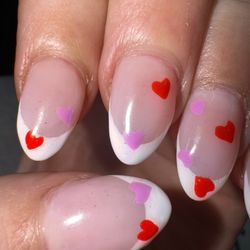 Tina Nails - Bubbles all on the white and the hearts. After she claimed to have fixed them.