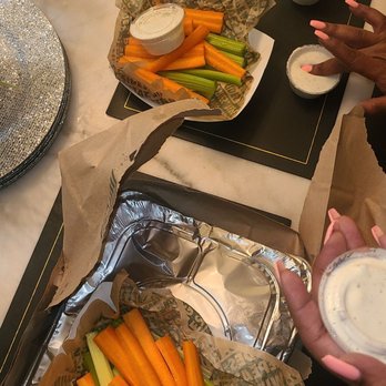 Wingstop - a tray of carrots and celery on a table - Chicken Wings Near Me - La Cañada Flintridge, California Wingstop - a tray of carrots and celery on a table - Chicken Wings Near Me - La Cañada Flintridge, California