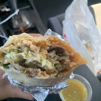 Maya Supermarket - Super carnitas burrito with green salsa - Mexican Near Me - Vacaville, California Maya Supermarket - Super carnitas burrito with green salsa - Mexican Near Me - Vacaville, California