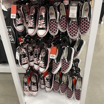 H-E-B - ows a display of shoes for sale - Grocery Near Me - Cibolo, Texas