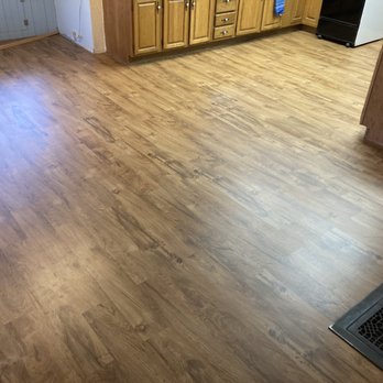 360 Homing - a hardwood floor in a kitchen - General Contractors Near Me
