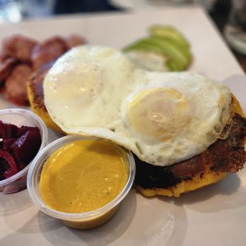 Cafe Fresco - Llapingachos (potato patty), penut sauce, sliced hot dog, avocado and a side of beets. - Breakfast & Brunch Near Me - Los Angeles, California