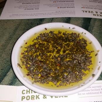 Carrabba's Italian Grill - Olive oil and herbs. - Italian Near Me - Aurora, Colorado Carrabba's Italian Grill - Olive oil and herbs. - Italian Near Me - Aurora, Colorado