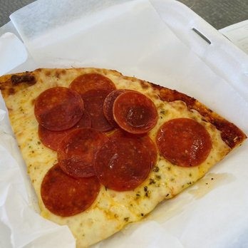 Mug's Pizza & Ribs - Slice of pizza - Pizza Near Me - Arlington Heights, Illinois Mug's Pizza & Ribs - Slice of pizza - Pizza Near Me - Arlington Heights, Illinois