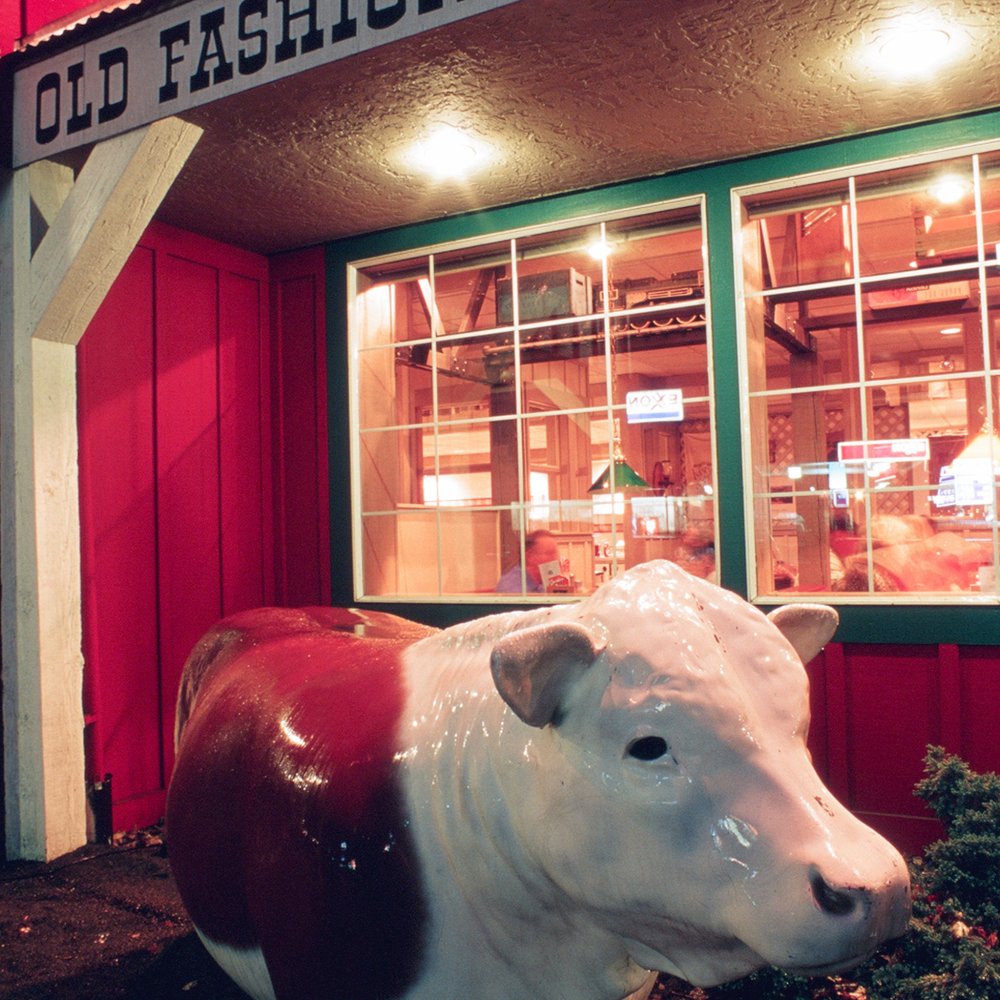 Cousins' - Statue of a cow in front of Cousins' - Sandwiches Near Me - The Dalles, Oregon