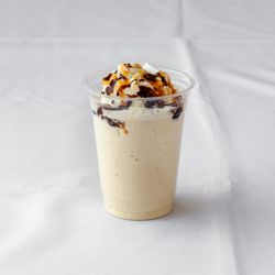 The Table - Classic vanilla malted milkshake, whipped cream, fudge and caramel sauce
