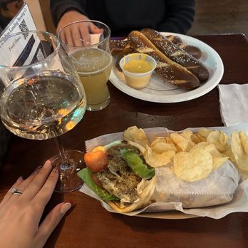 Bolton Landing Brewing - Sweet and refreshing glass of rose, hubbys beer, pretzel and cheese app, and the most delicious Mediterranean chicken wrap - Breweries Near Me - Bolton, New York