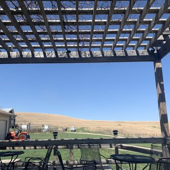 Prairie Fire Winery - a patio with tables and chairs - Wineries Near Me - Paxico, Kansas Prairie Fire Winery - a patio with tables and chairs - Wineries Near Me - Paxico, Kansas