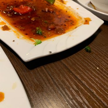 Lao Sze Chuan Chinese Restaurant - Flies at the side of plate. - Szechuan Near Me - Champaign, Illinois Lao Sze Chuan Chinese Restaurant - Flies at the side of plate. - Szechuan Near Me - Champaign, Illinois