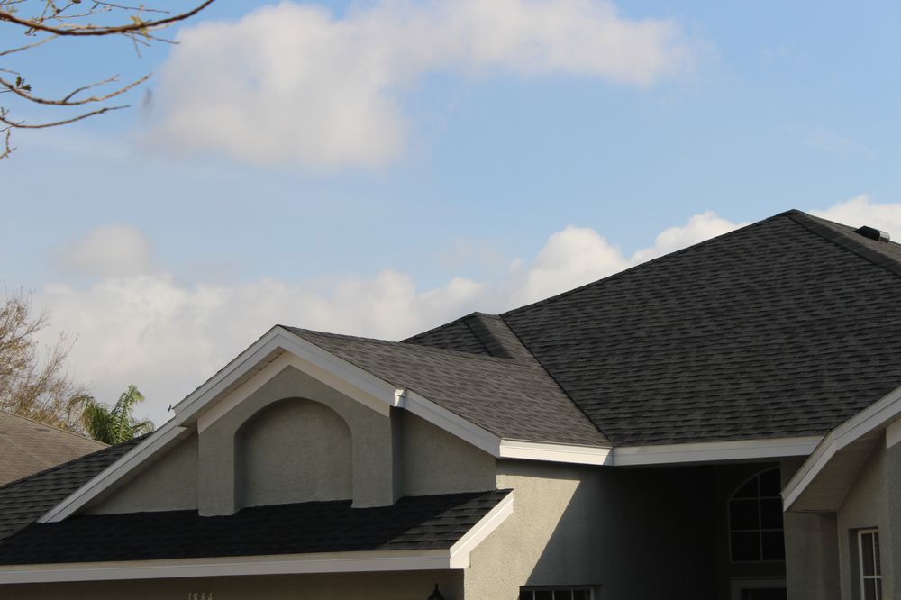 Slide of Arry's Roofing Services