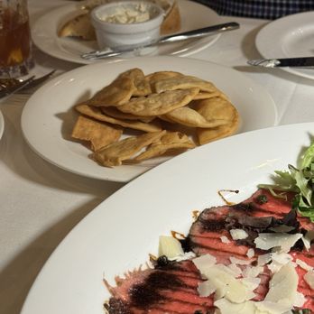 Arthur's Prime Steakhouse - Wagyu Beef Carpaccio with side of pita chips - Steakhouses Near Me - Little Rock, Arkansas