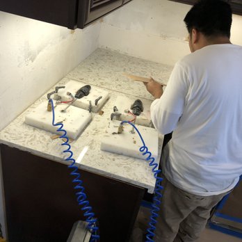 Artistic Stone Kitchen & Bath - Working on achieving a near perfect seam. - Building Supplies Near Me - San Leandro, California Artistic Stone Kitchen & Bath - Working on achieving a near perfect seam. - Building Supplies Near Me - San Leandro, California
