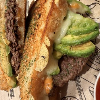 The Melt - Patty melt with avocado no pickles and with the spicy garlic bread - Burgers Near Me - San Diego, California The Melt - Patty melt with avocado no pickles and with the spicy garlic bread - Burgers Near Me - San Diego, California