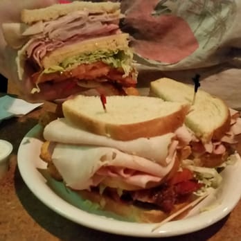 Wilhelm's Spirits & Eatery - The Wilhelms Club is the biggest/Best sandwich I have ever seen! I couldn't even finish the 1/3 I am holding here! - Sports Bars Near Me - Albany, Oregon Wilhelm's Spirits & Eatery - The Wilhelms Club is the biggest/Best sandwich I have ever seen! I couldn't even finish the 1/3 I am holding here! - Sports Bars Near Me - Albany, Oregon