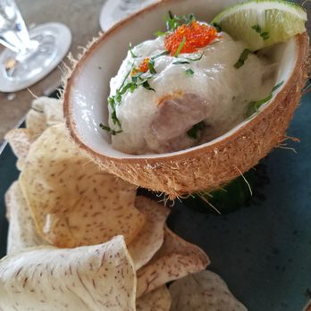 Tidepools - Tahitian cevichi! Slightly spicy, totally delicious! Eat the coconut out of the shell. - Hawaiian Near Me - Poipu, Hawaii Tidepools - Tahitian cevichi! Slightly spicy, totally delicious! Eat the coconut out of the shell. - Hawaiian Near Me - Poipu, Hawaii