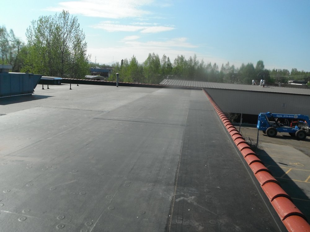 Slide of Action Roofing Services