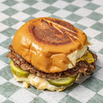 7th Street Burger Park Slope - Double Impossible patty served with American cheese, grilled onions, pickles and house sauce on a Martin's potato bun - Burgers Near Me - Brooklyn, New York 7th Street Burger Park Slope - Double Impossible patty served with American cheese, grilled onions, pickles and house sauce on a Martin's potato bun - Burgers Near Me - Brooklyn, New York