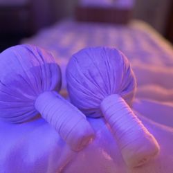 Serene Head Spa - Thai herbal compress massage balls. Used alongside our river stones to promote muscle pain relief, and circulation.