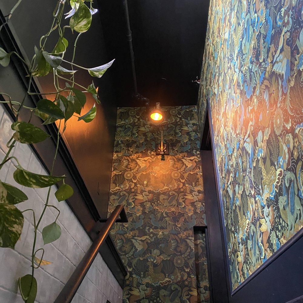 Flora - Staircase to the speakeasy. - Cocktail Bars Near Me - Beaverton, Oregon