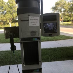 This is the station for customers. You can use the phone if you want. You send your money and pick up your prescriptions in a tube.