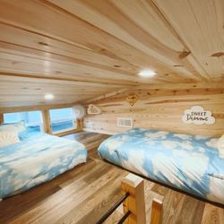 Pelican Palms RV Resort - Blue Angel Bungalow tiny home cabin sleeping loft