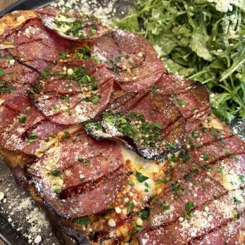 All' Assassina - Forget the name but it's the very popular Pisa with pepperoni and arugula on the side. Show stopper. - Italian Near Me - Union, New Jersey