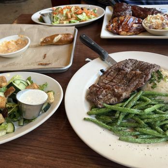Rock Bottom Restaurant & Brewery - GRILLED 12 OZ RIBEYE BBQ RIBS & CHICKEN COMBO BAVARIAN PRETZEL STICKS HOUSE SALAD - Breweries Near Me - Denver, Colorado Rock Bottom Restaurant & Brewery - GRILLED 12 OZ RIBEYE BBQ RIBS & CHICKEN COMBO BAVARIAN PRETZEL STICKS HOUSE SALAD - Breweries Near Me - Denver, Colorado