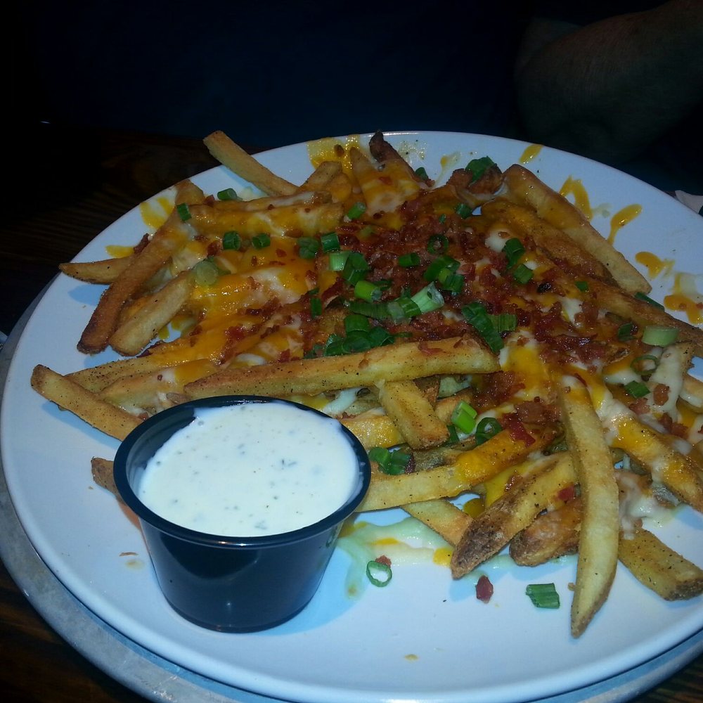 Miller's Ale House - Their loaded fries- not greasy at all! - Sports Bars Near Me - Seminole, Florida Miller's Ale House - Their loaded fries- not greasy at all! - Sports Bars Near Me - Seminole, Florida