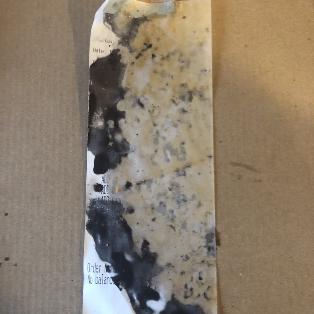 This was taped under my pizza. Delicious. Not.