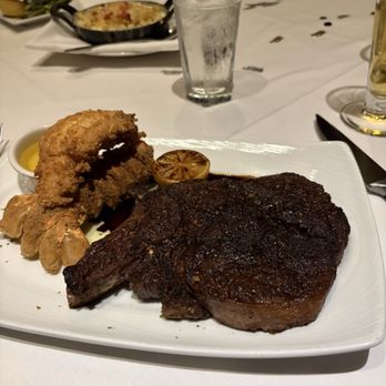 The Capital Grille - Porcini-Rubbed Bone-In Ribeye with 15-Year Aged Balsamic and South African fried lobster tail (the daily special). The tail was delicious. - Steakhouses Near Me - Atlanta, Georgia The Capital Grille - Porcini-Rubbed Bone-In Ribeye with 15-Year Aged Balsamic and South African fried lobster tail (the daily special). The tail was delicious. - Steakhouses Near Me - Atlanta, Georgia