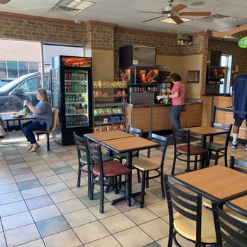 Subway - the inside of a restaurant with tables and chairs - Sandwiches Near Me - Memphis, Tennessee