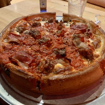 Papa Del's Pizza - Medium Deep dish with sausage, mushrooms and bacon. - Pizza Near Me - Champaign, Illinois Papa Del's Pizza - Medium Deep dish with sausage, mushrooms and bacon. - Pizza Near Me - Champaign, Illinois