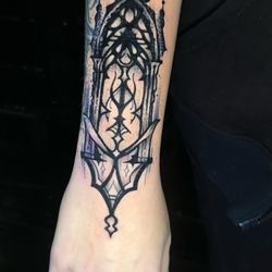 Old 7 Tattoo - Gothic window tattoo in black and grey made by Jessika Elo.