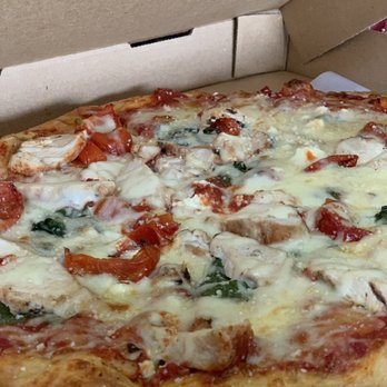 Mellow Mushroom Sandy Springs - Pizza with thin crust- spinach, feta, sun-dried tomatoes and chicken - Pizza Near Me - Sandy Springs, Georgia