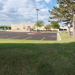 Mohawk Elementary - My view of New resurfaced asphalt parking lot from Romeo Plank Rd.   8/15/2022