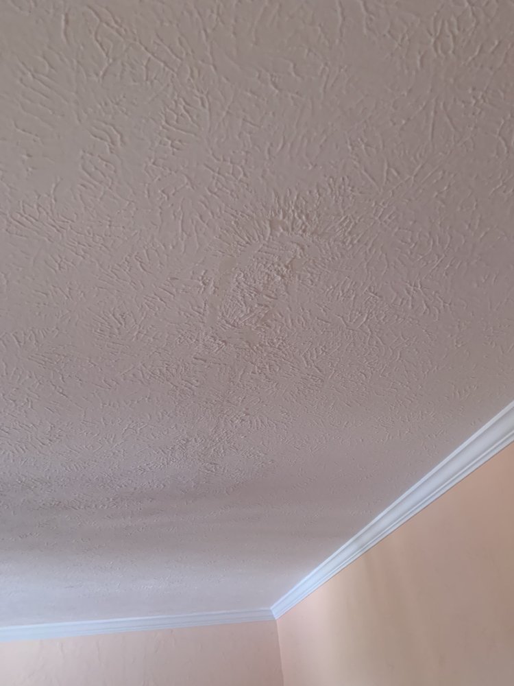 Slide of Lovelace Roofing