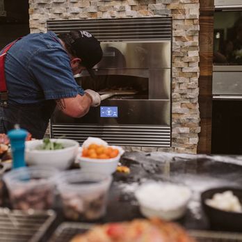 Masters Wholesale - Cooking Pizza in our Monogram Pizza Oven - Appliances Near Me - Rancho Cordova, California Masters Wholesale - Cooking Pizza in our Monogram Pizza Oven - Appliances Near Me - Rancho Cordova, California
