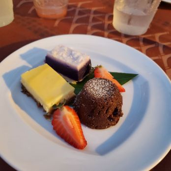 Mauna Kea Luau - The dessert was really good! Cheesecake, chocolate lava cake and sweet potato coconut piece - Performing Arts Near Me - Kohala, Hawaii