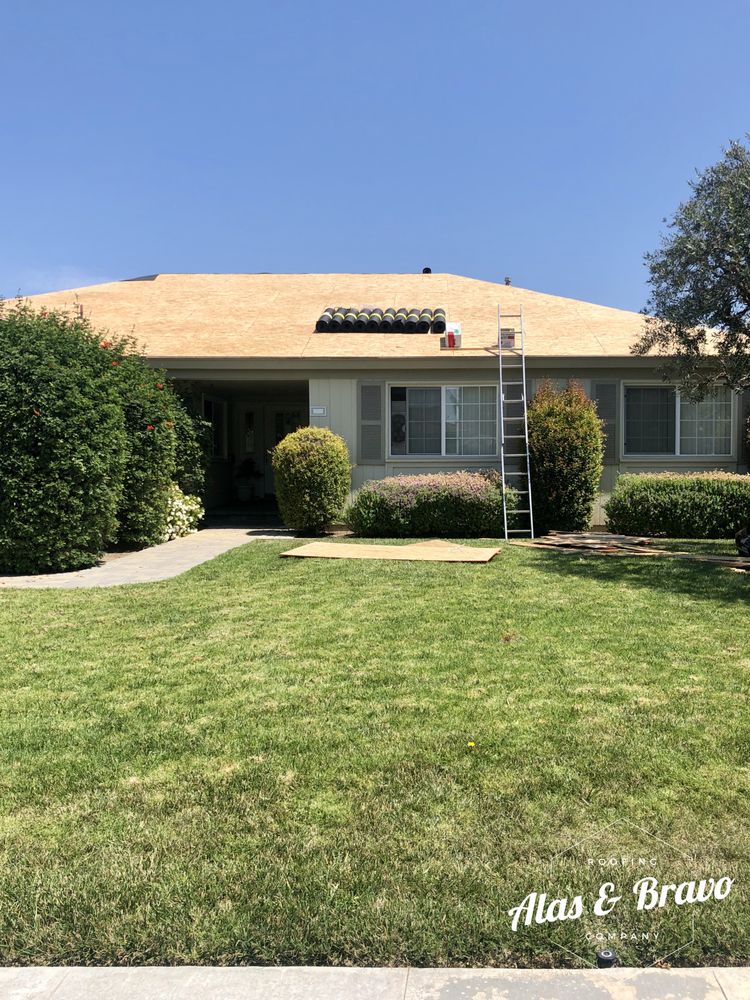 Slide of Alas & Bravo Roofing Company